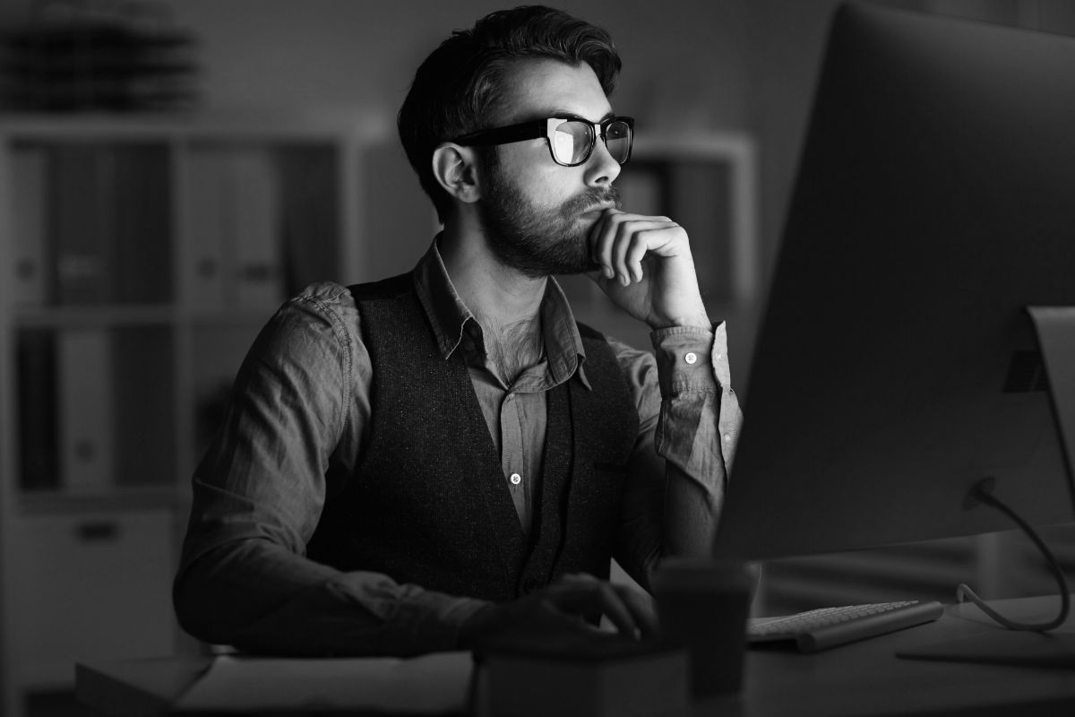 Rıdvan Topal working at a desk